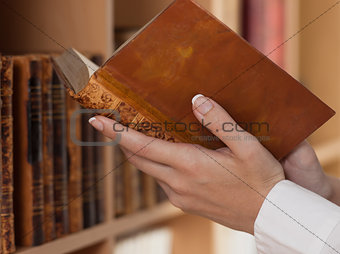 woman Hands holding ancient books