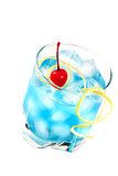 Blue alcohol cocktail with maraschino