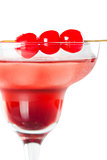 Red tropical cocktail with cherry