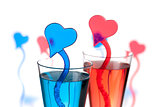 Two champagne alcohol cocktails with heart decoration