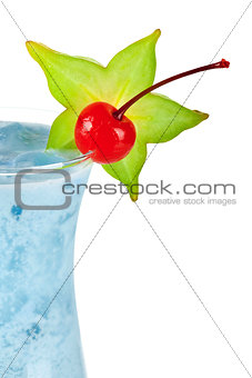 Blue tropical cocktail with coconut cream