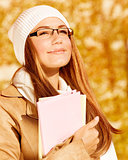 Portrait of student girl in autumn