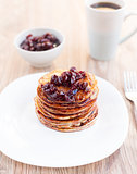 Delicious pancakes with cherry jam