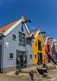 Colorful houses against a bright blue sky