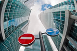 Road signs on the background of office buildings. Moscow City.