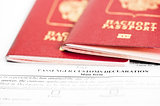 Two passports are on the passenger custom declaration