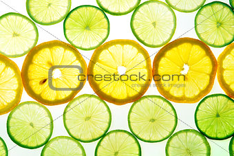 Yellow lemon and green lime slices