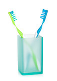 Two multicolored toothbrushes