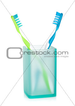 Two multicolored toothbrushes
