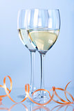 Two wine glasses with white wine