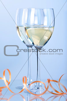 Two wine glasses with white wine