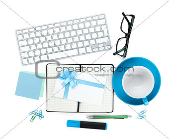 Coffee cup, office supplies and letter