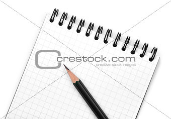 Black pencil on notepad
