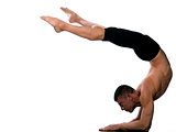 Man yoga scorpion Vrschikasana Pose