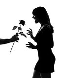 stylish silhouette man hand offering a flower rose 