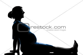 pregnant woman sitting laughing happy