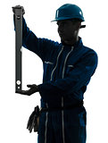 man construction worker holding level silhouette