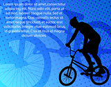 stunt bicyclist on the abstract background