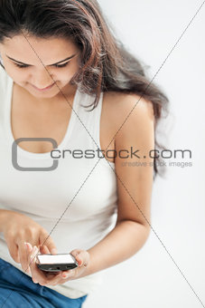 Indian girl with mobile smart phone