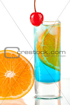 Alcohol cocktail with blue curacao, orange and maraschino