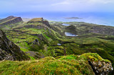 Scenic view of green Quiraing coastline in Scottish highlands