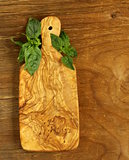 kitchen cutting board on a wooden background