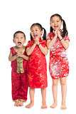 Little Asian children wishing you a happy Chinese New Year
