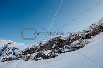 Mountain Peak and Airplane Trail near Megeve in French Alps, Fra