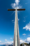Cross Against the Blue Sky - Lussari Italy
