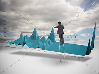 Businessman on a ladder catching the tip of a chart