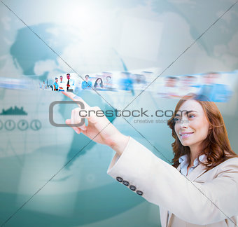 Smiling businesswoman scrolling pictures