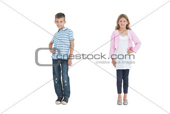 Cheerful young brother and sister posing