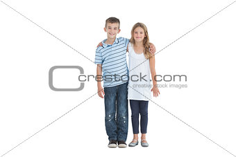 Young brother and sister holding each other