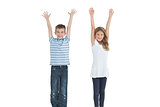 Happy young brother and sister cheering