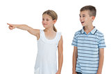 Young girl showing something to her brother