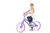 Cute young girl riding bike