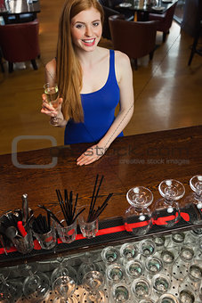 Attractive woman having a flute of champagne
