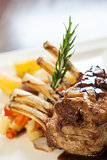 Delicious rack of lamb dish with rosemary sprig