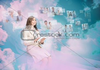 Beautiful businesswoman using digital interface