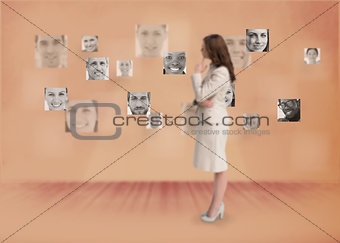 Businesswoman looking at digital interface