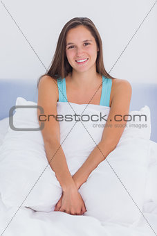 Woman resting in bed