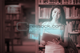 Happy cute student working on her futuristic tablet pc