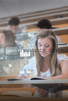 Concentrated college student working on digital interface