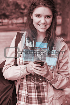 Smiling young woman working on her futuristic smartphone