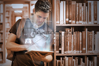 Handsome college student working on his digital tablet pc with futuristic interface