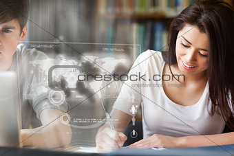 Cheerful college student analysing map on digital interface