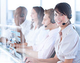 Pretty call center worker using futuristic holographic interface