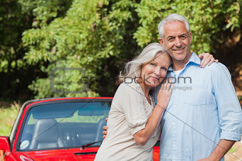 Cheerful mature couple posing