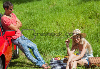 Happy couple having picnic together