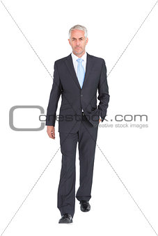 Businessman walking to camera